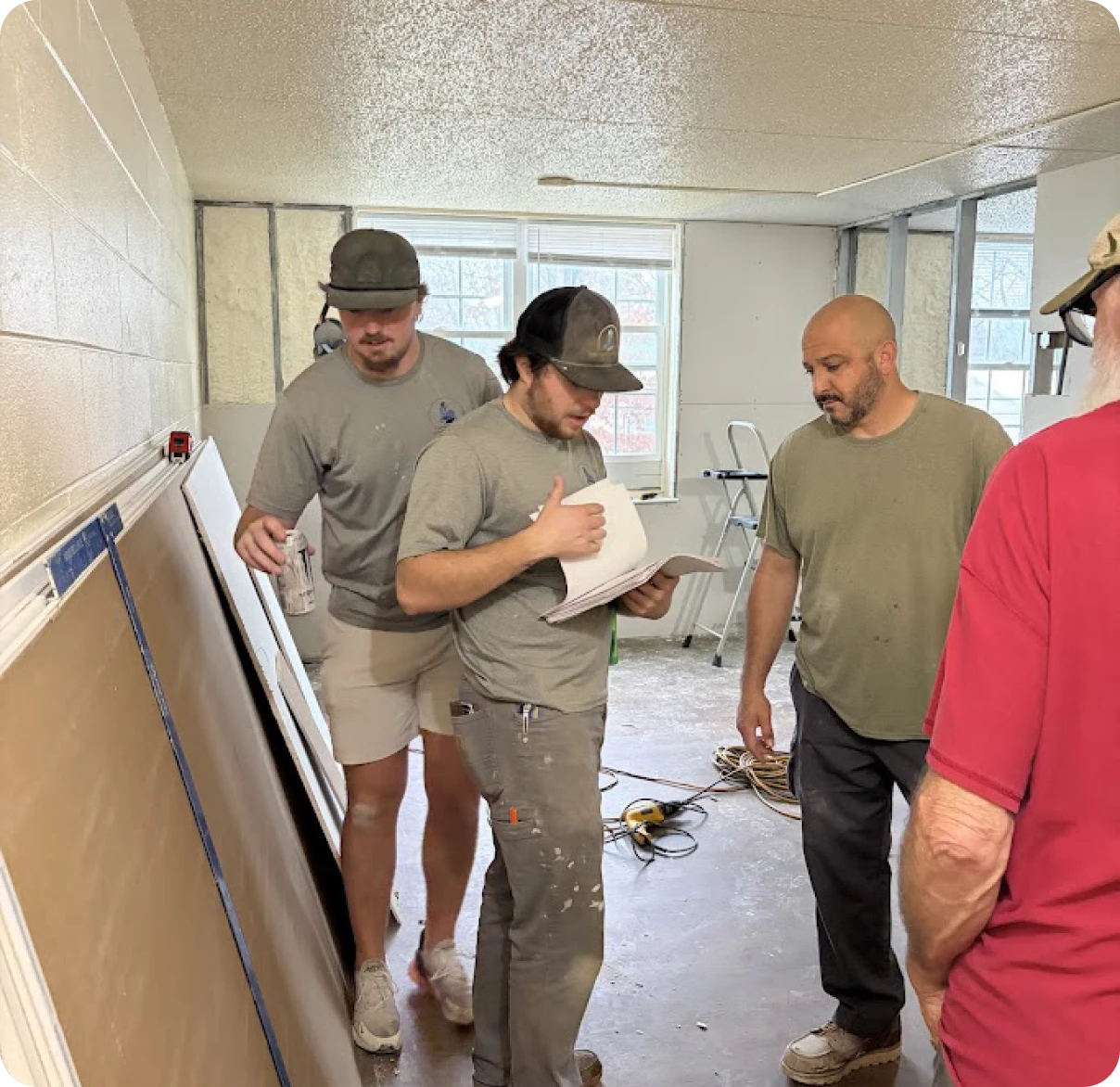Construction team reviewing plans
