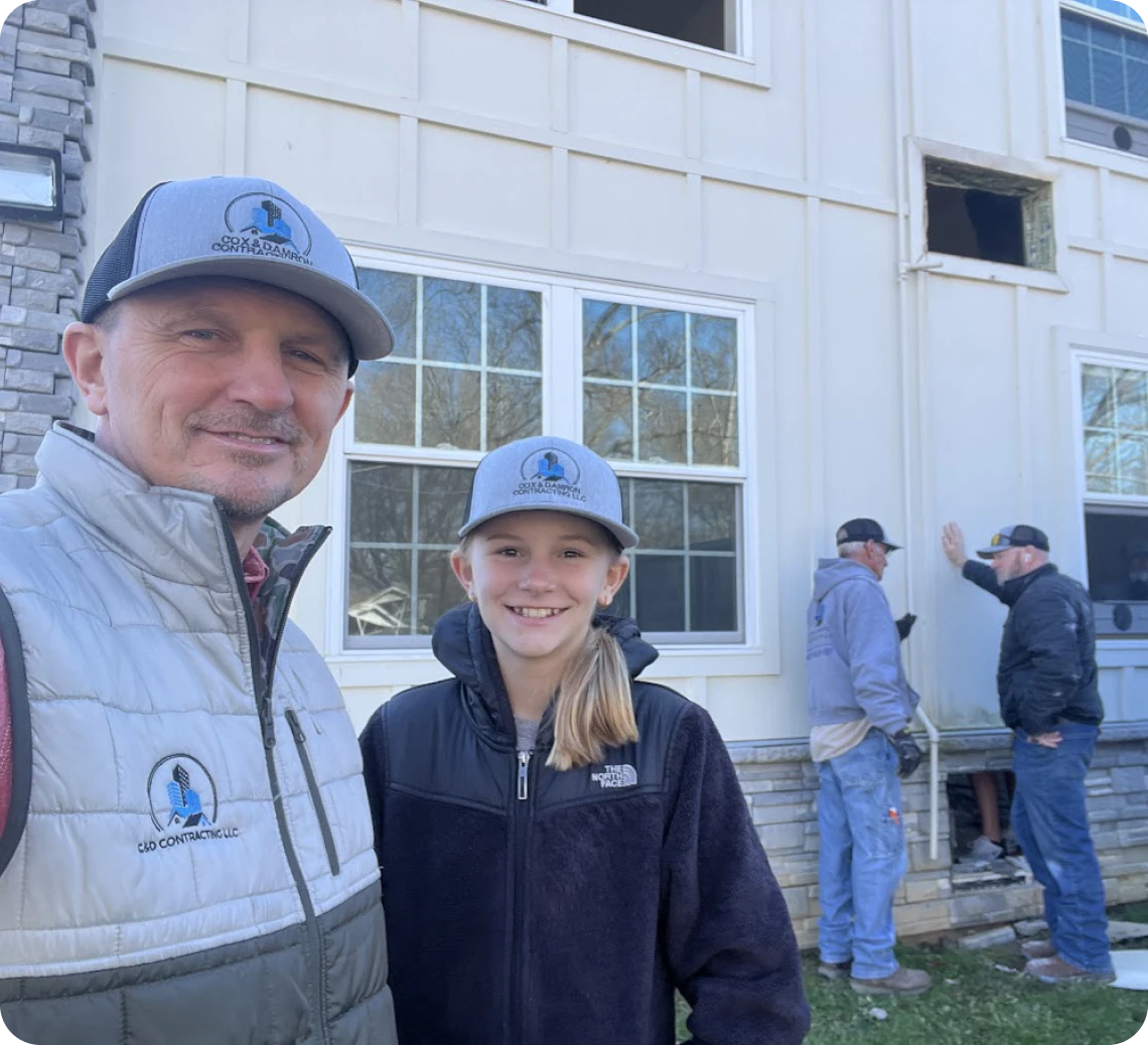 Family at building renovation site