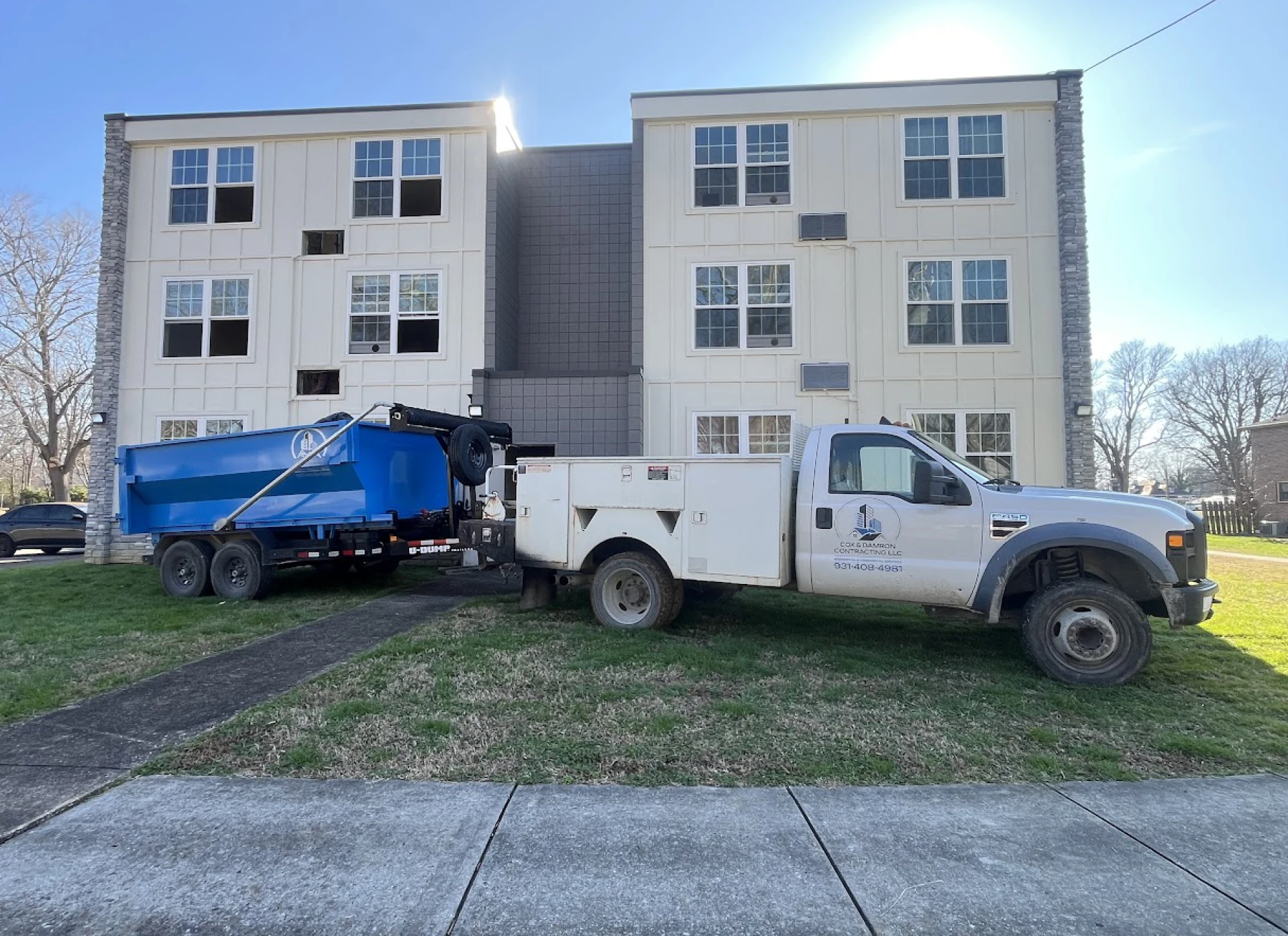 Construction vehicle parked on grass
