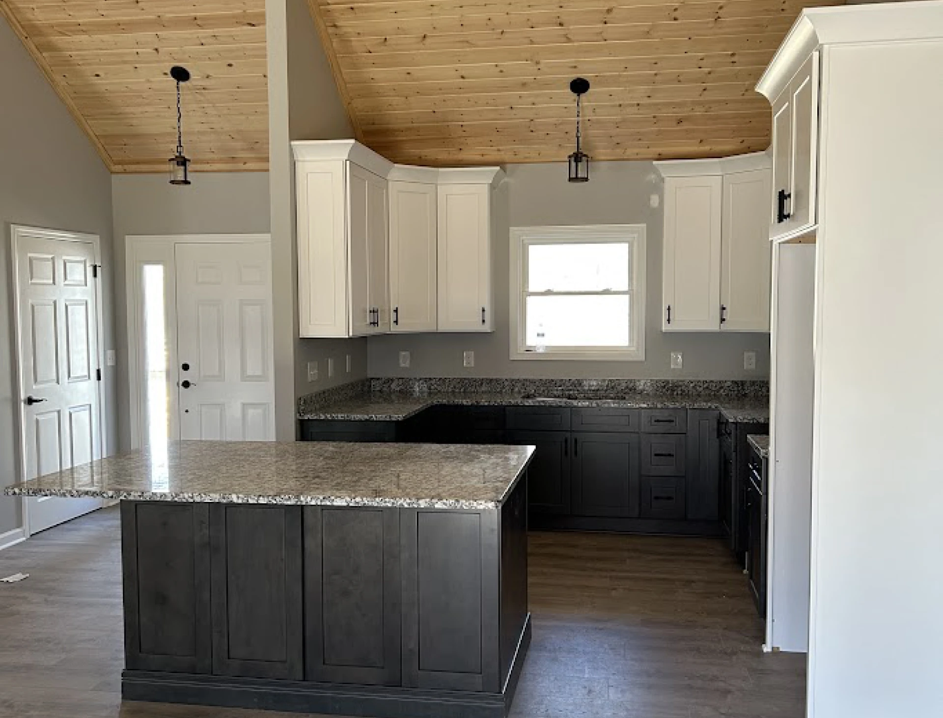 Open kitchen with vaulted ceiling